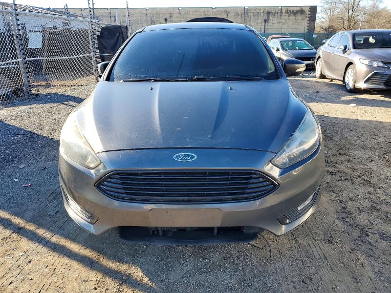 Photo 5 from auction – 2016 FORD FOCUS with VIN 1FADP3FE8GL224391