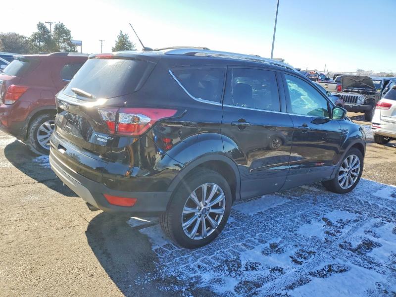 Photo 3 from auction – 2017 FORD ESCAPE TIT with VIN 1FMCU9J92HUC69927