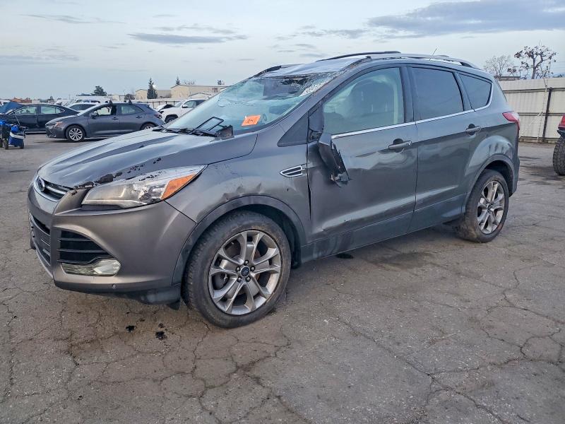 Photo 1 from auction – 2014 FORD ESCAPE TIT with VIN 1FMCU9J9XEUE47837