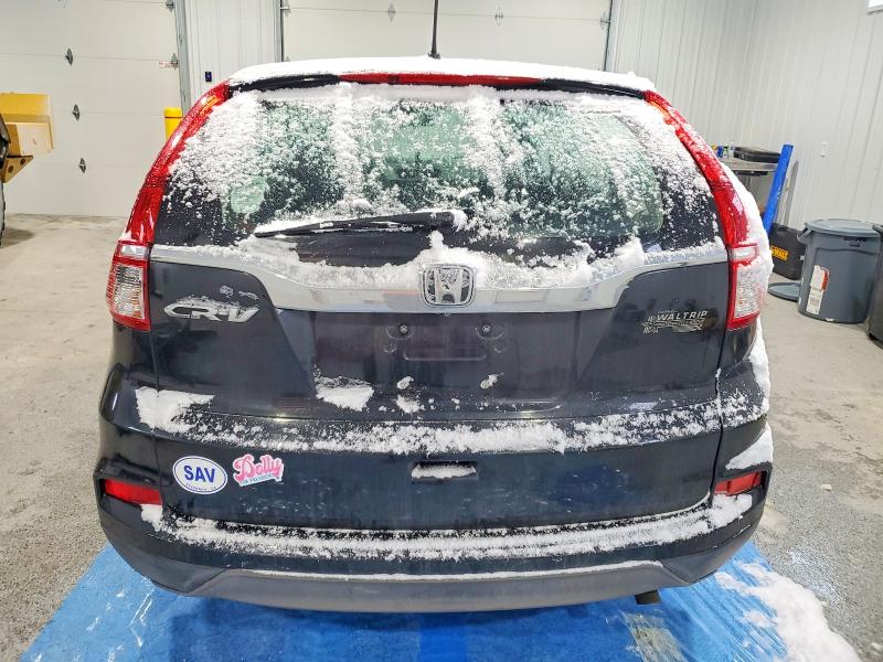 Photo 6 from auction – 2016 HONDA CR-V LX with VIN 2HKRM3H32GH547893