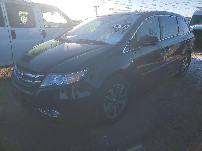 HONDA ODYSSEY TO 2014 with VIN 5FNRL5H91EB028056 - Photo from auction