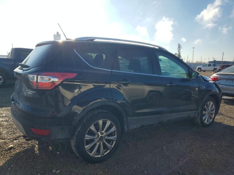 Photo 3 from auction – 2017 FORD ESCAPE with VIN 1FMCU9JD5HUB14342