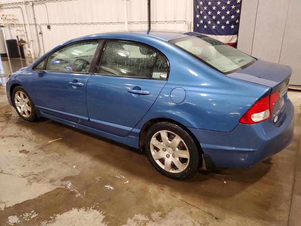 Photo 2 from auction – 2011 HONDA CIVIC LX with VIN 19XFA1F58BE028820