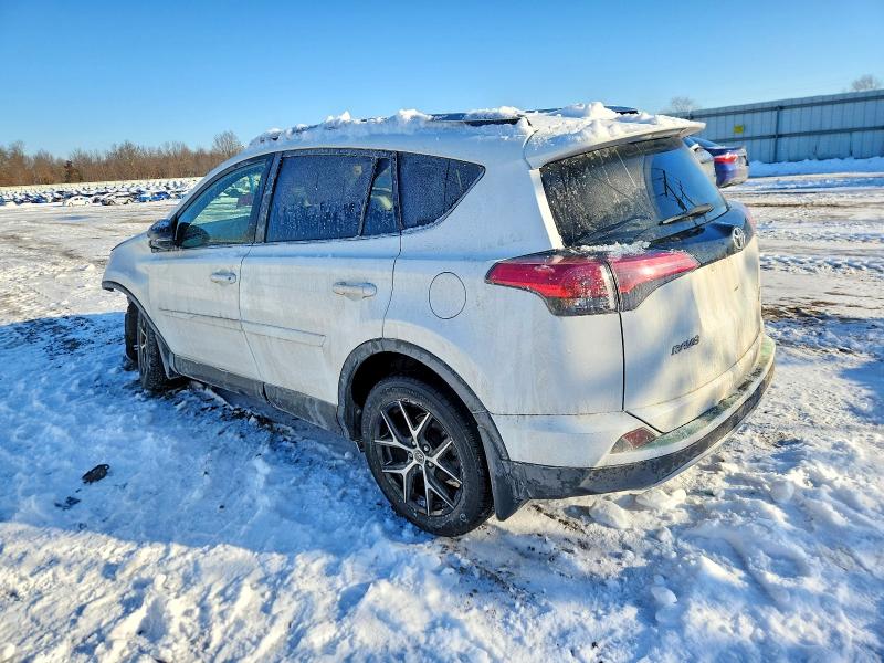 Photo 2 from auction – 2016 TOYOTA RAV4 SE with VIN JTMJFREV4GJ075218