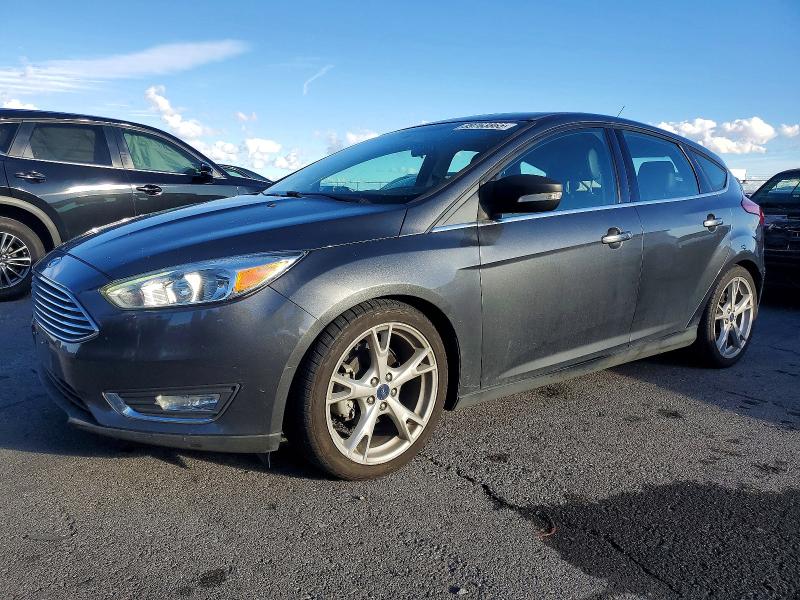 FORD FOCUS TITA 2016 with VIN 1FADP3N27GL407059 - Photo from auction