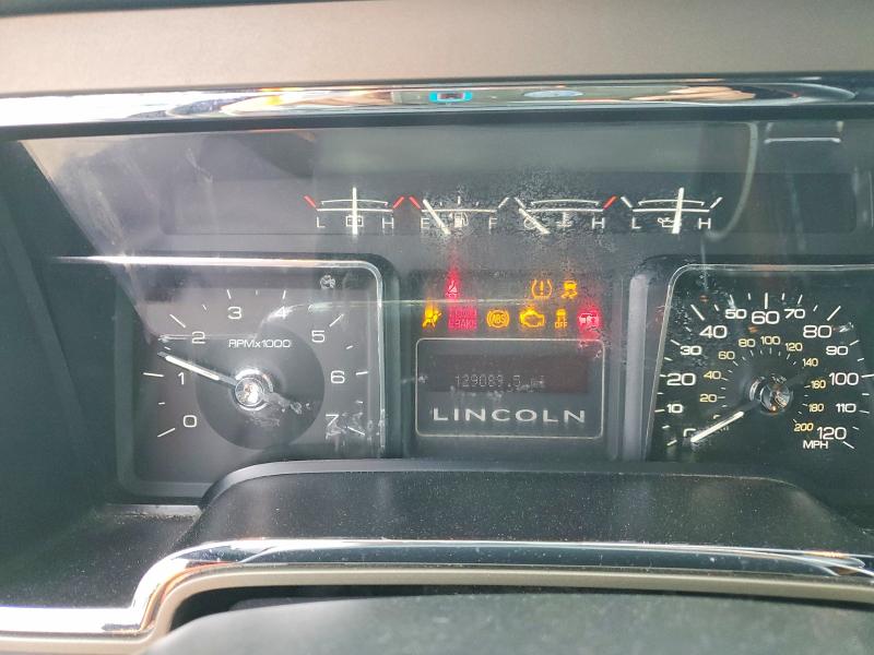 Photo 9 from auction – 2014 LINCOLN NAVIGATOR with VIN 5LMJJ2H56EEL01128