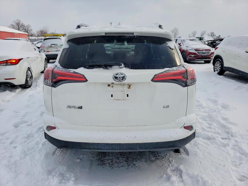 Photo 6 from auction – 2018 TOYOTA RAV4 LE with VIN 2T3ZFREV2JW507459