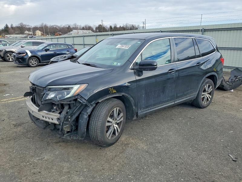HONDA PILOT EX 2017 with VIN 5FNYF6H40HB099296 - Photo from auction