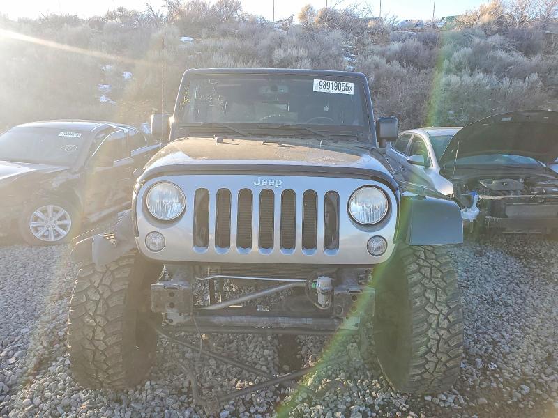 Photo 5 from auction – 2014 JEEP WRANGLER U with VIN 1C4BJWDG9EL222915