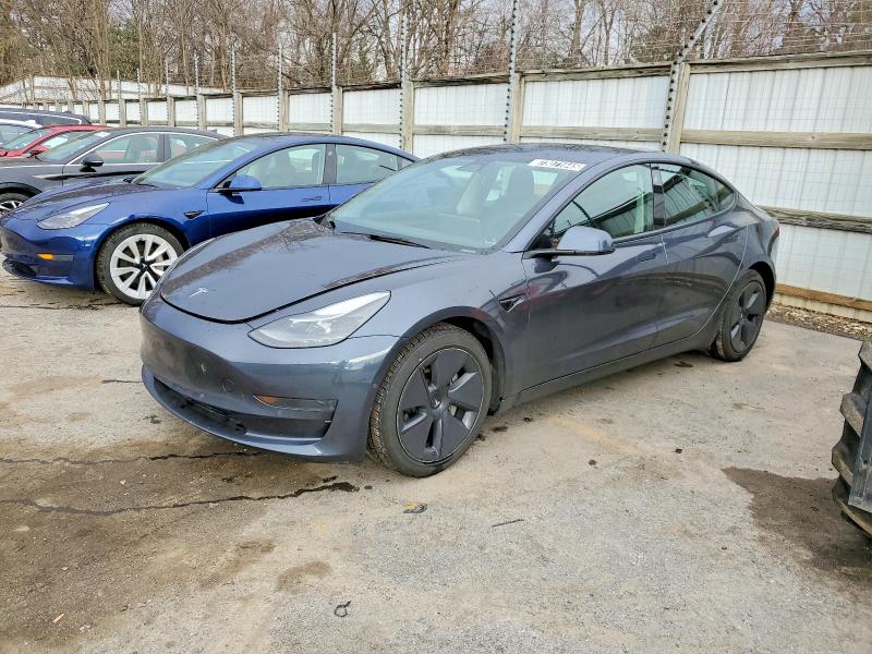 TESLA MODEL 3 2022 with VIN 5YJ3E1EA9NF372502 - Photo from auction