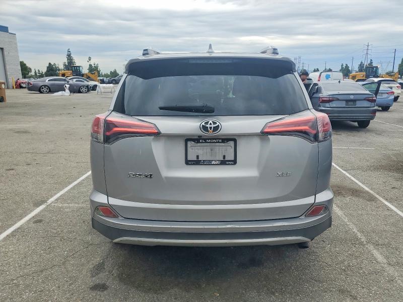 Photo 6 from auction – 2016 TOYOTA RAV4 with VIN 2T3WFREV6GW247479