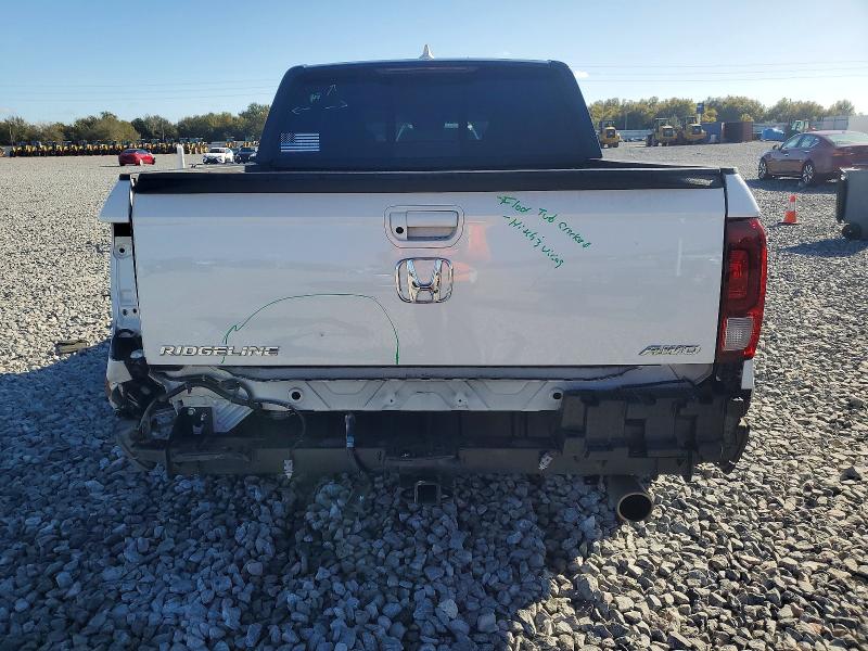 Photo 6 from auction – 2022 HONDA RIDGELINE with VIN 5FPYK3F85NB034253