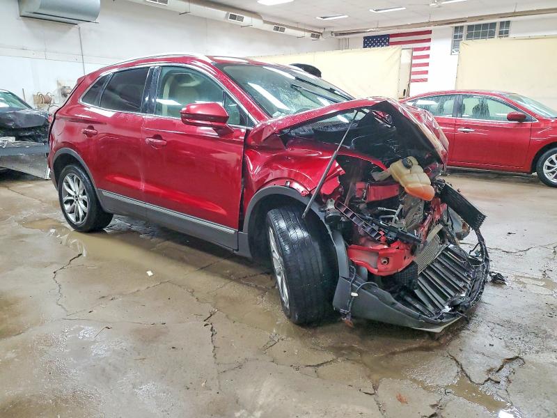 Photo 4 from auction – 2015 LINCOLN MKC with VIN 5LMTJ2AH7FUJ05459