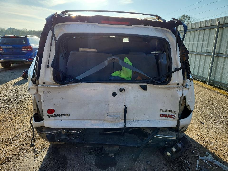 Photo 6 from auction – 2004 GMC YUKON with VIN 1GKEC13Z04R175805