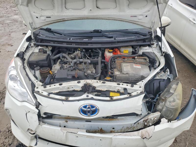 Photo 11 from auction – 2013 TOYOTA PRIUS C with VIN JTDKDTB37D1037049