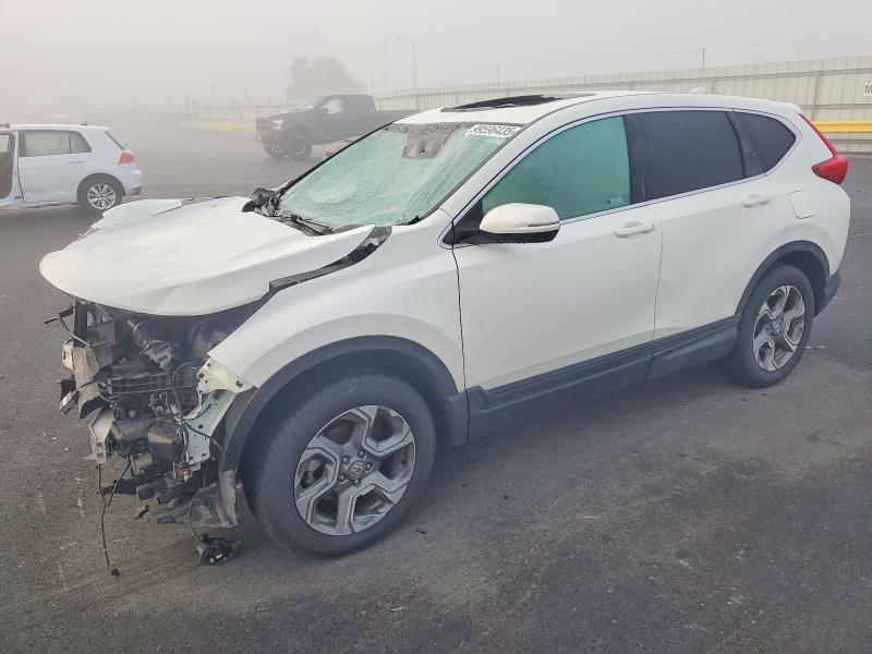 HONDA CR-V 2018 with VIN 2HKRW2H81JH687957 - Photo from auction