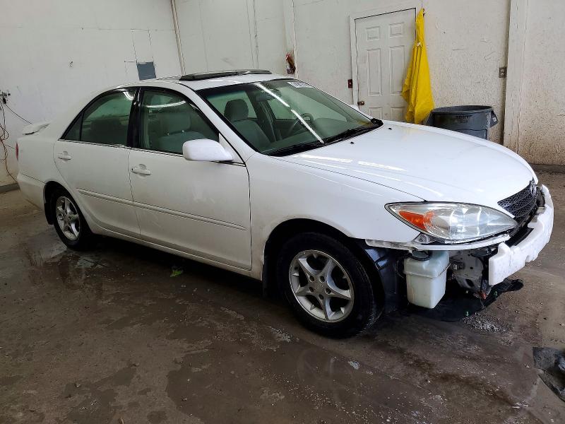 Photo 4 from auction – 2003 TOYOTA CAMRY LE with VIN 4T1BE32K73U179897