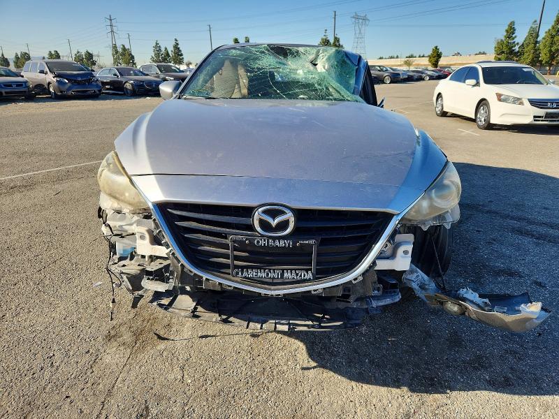 Photo 5 from auction – 2015 MAZDA 3 with VIN JM1BM1L31F1228049