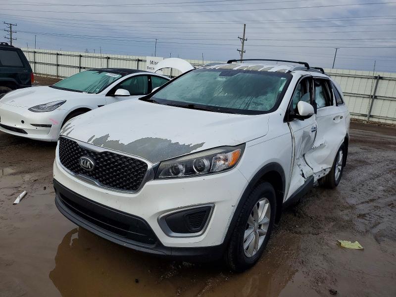 KIA SORENTO 2016 with VIN 5XYPG4A31GG075885 - Photo from auction