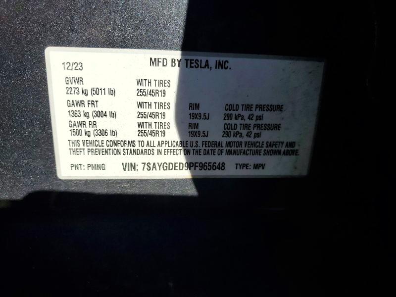 Photo 14 from auction – 2023 TESLA MODEL Y with VIN 7SAYGDED9PF965648