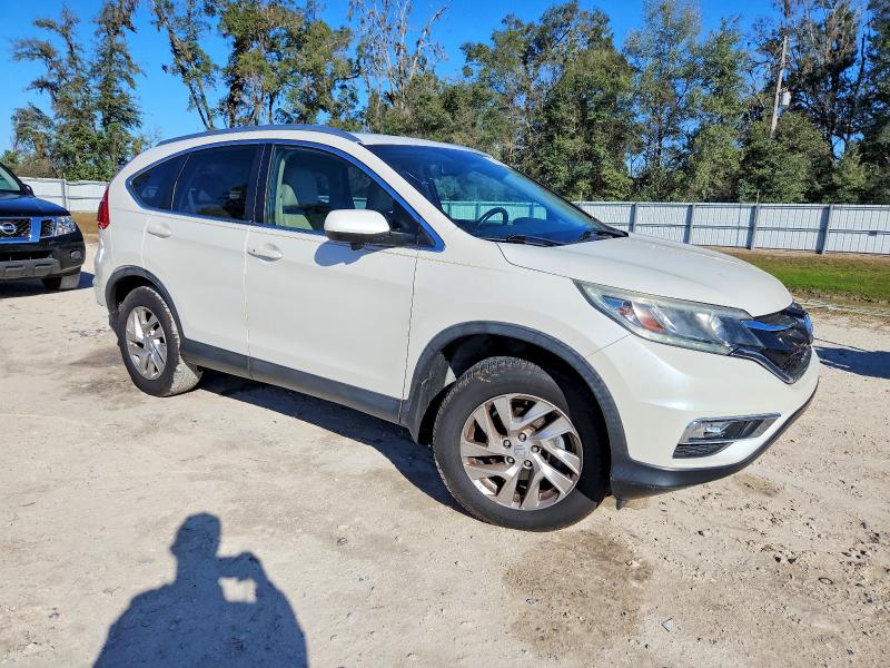 Photo 4 from auction – 2015 HONDA CR-V with VIN 5J6RM3H75FL023886