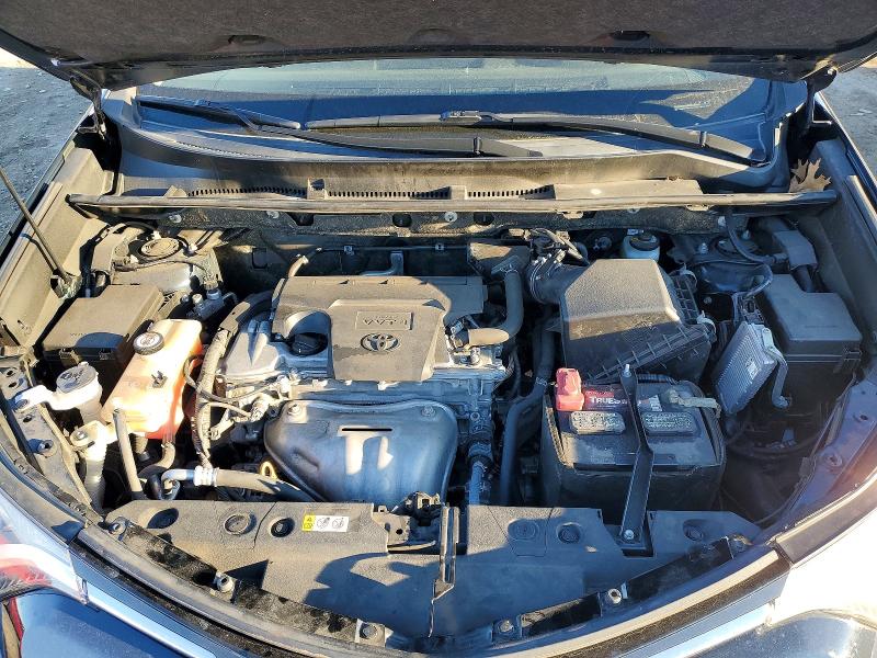 Photo 12 from auction – 2018 TOYOTA RAV4 LE with VIN JTMBFREV9JD256860