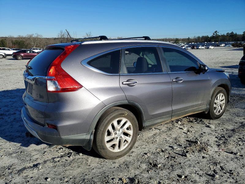 Photo 3 from auction – 2015 HONDA CR-V with VIN 2HKRM3H72FH501742