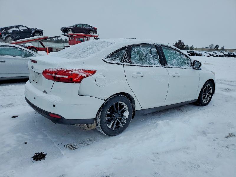 Photo 3 from auction – 2015 FORD FOCUS with VIN 1FADP3F23FL385462