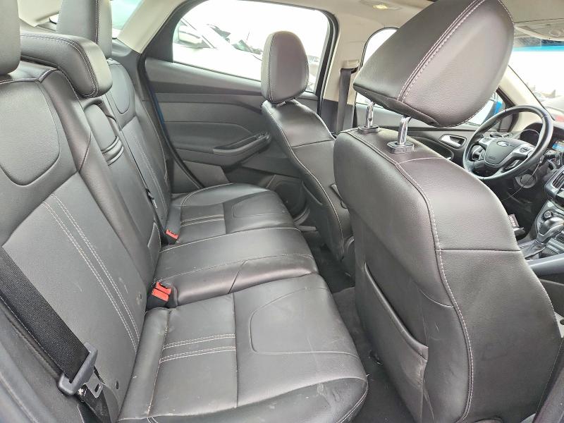 Photo 10 from auction – 2013 FORD FOCUS TITA with VIN 1FADP3J28DL345883