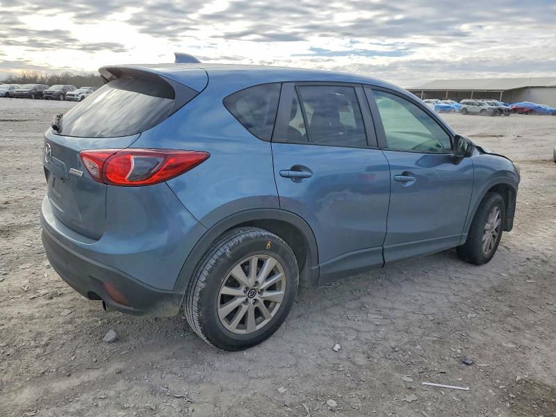 Photo 3 from auction – 2014 MAZDA CX-5 TOURI with VIN JM3KE2CY3E0392980
