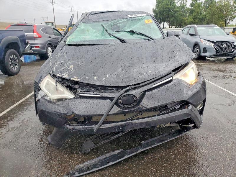 Photo 5 from auction – 2018 TOYOTA RAV4 with VIN 2T3WFREV0JW484668