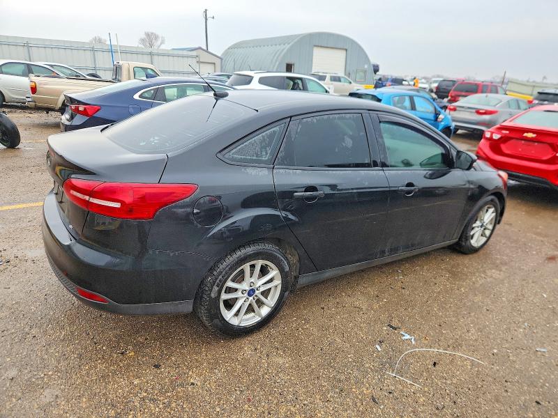 Photo 3 from auction – 2015 FORD FOCUS with VIN 1FADP3F25FL373538
