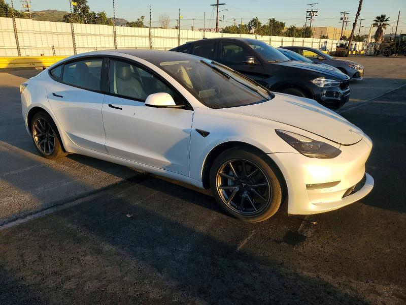 Photo 4 from auction – 2022 TESLA MODEL 3 with VIN 5YJ3E1EA7NF307521