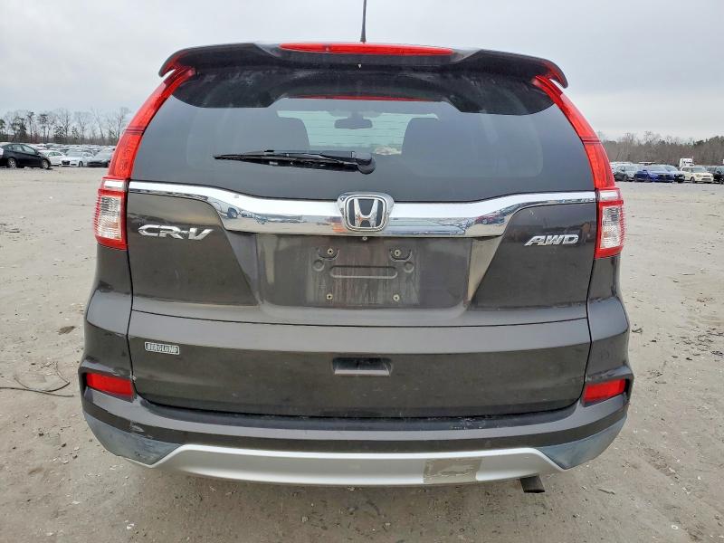 Photo 6 from auction – 2015 HONDA CR-V EXL with VIN 2HKRM4H70FH629628