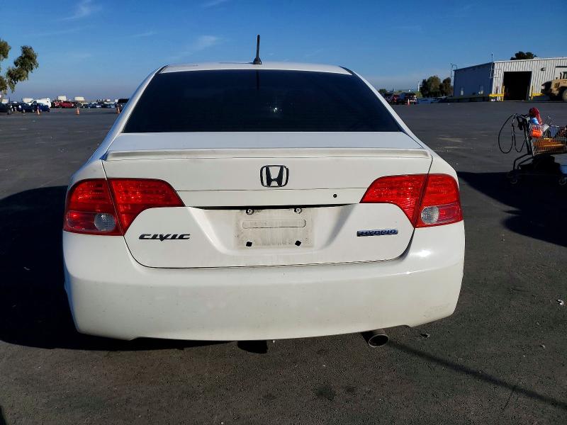 Photo 6 from auction – 2006 HONDA CIVIC HYBR with VIN JHMFA36236S028601