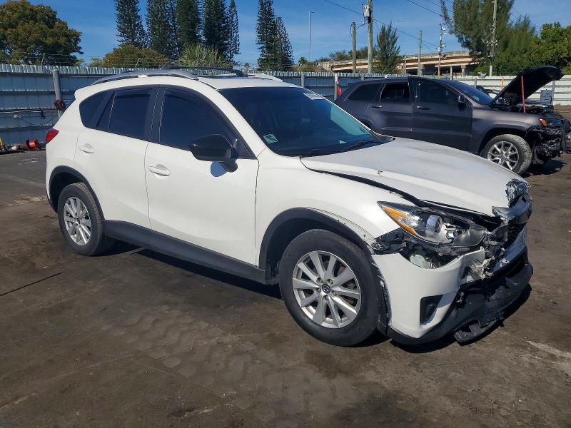 Photo 4 from auction – 2014 MAZDA CX-5 with VIN JM3KE2CY6E0320929