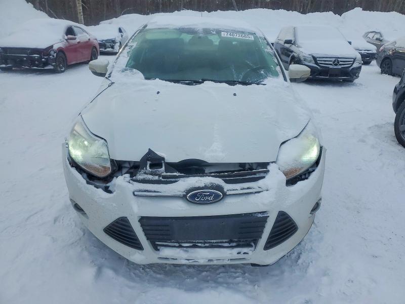 Photo 5 from auction – 2014 FORD FOCUS with VIN 1FADP3F28EL415148