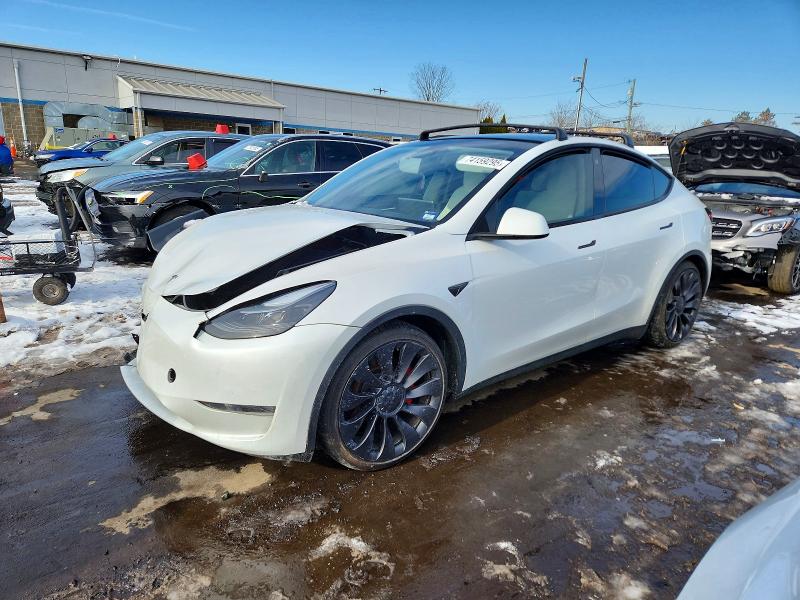 TESLA MODEL Y 2023 with VIN 7SAYGDEF4PF663086 - Photo from auction