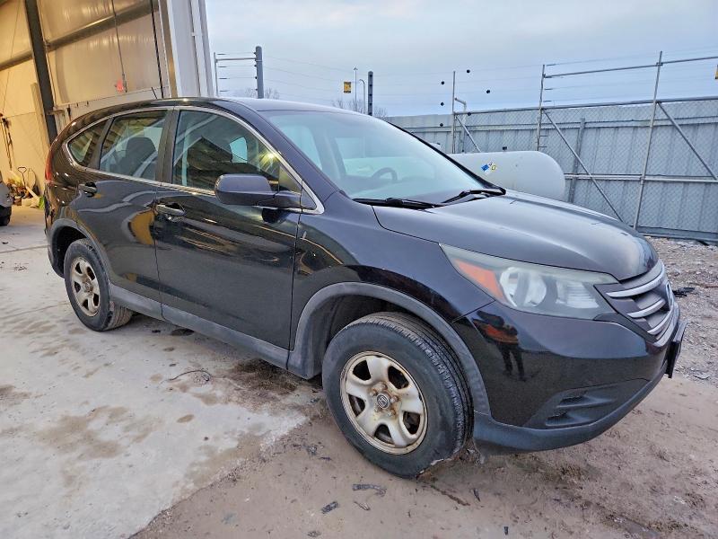 Photo 4 from auction – 2014 HONDA CR-V LX with VIN 2HKRM3H33EH555305