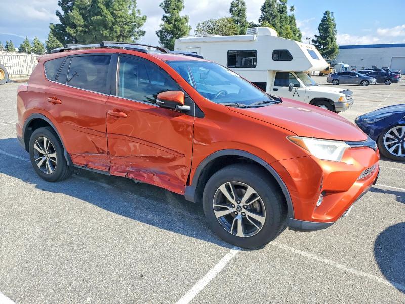 Photo 4 from auction – 2016 TOYOTA RAV4 with VIN 2T3WFREVXGW256492