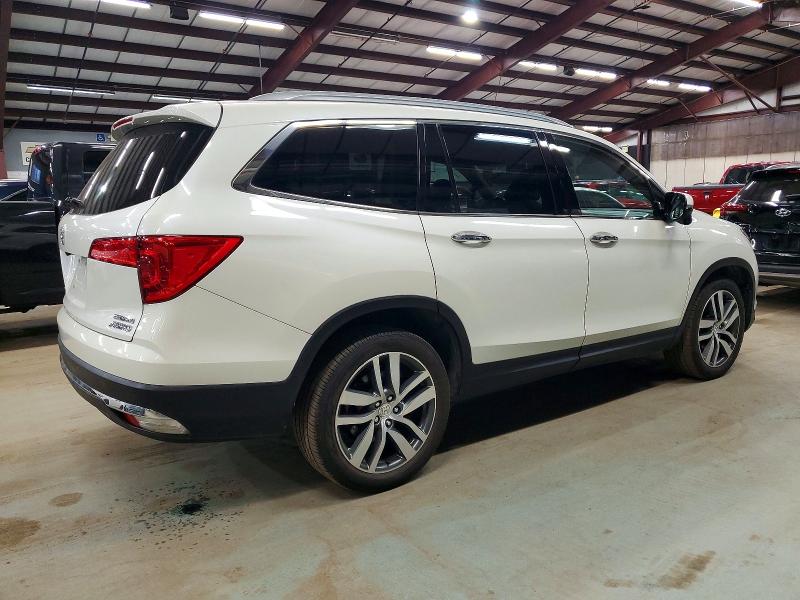 Photo 3 from auction – 2016 HONDA PILOT TOUR with VIN 5FNYF6H93GB054508