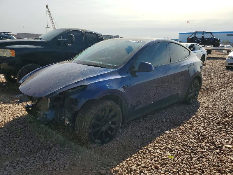 TESLA MODEL Y 2023 with VIN 7SAYGAEE2PF624826 - Photo from auction