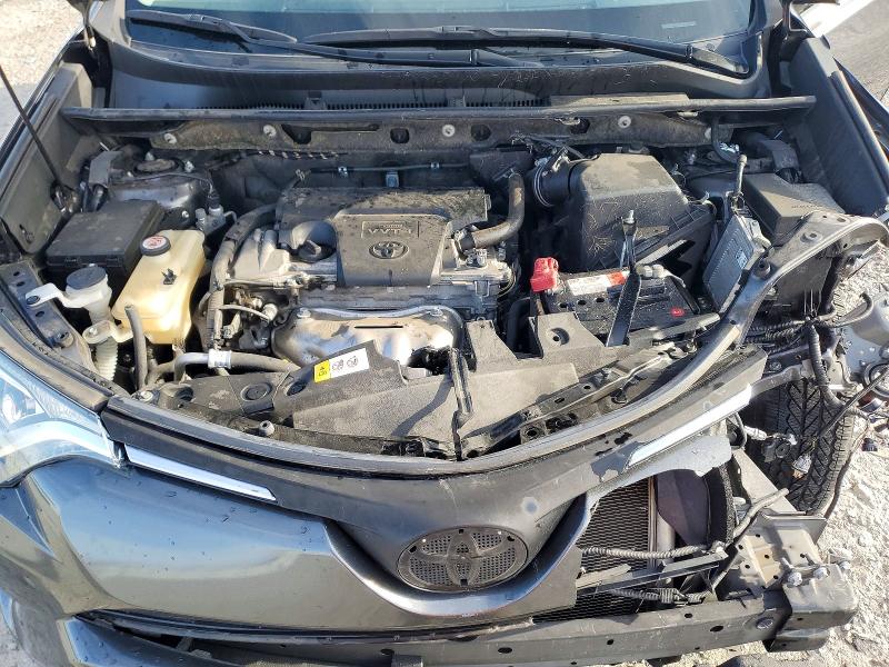 Photo 12 from auction – 2018 TOYOTA RAV4 LE with VIN JTMBFREV3JJ732571