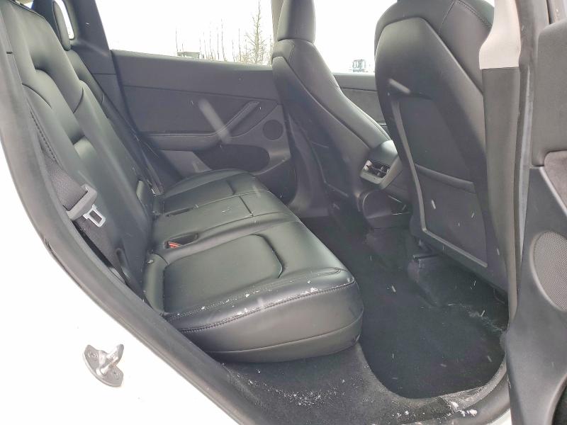 Photo 10 from auction – 2023 TESLA MODEL Y with VIN LRWYGDEE0PC028669
