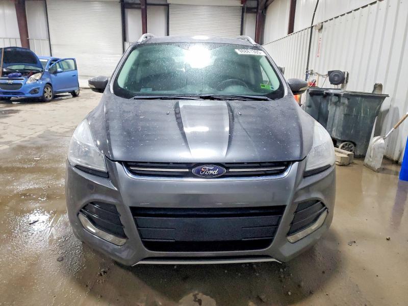 Photo 5 from auction – 2016 FORD ESCAPE TIT with VIN 1FMCU9JX1GUB12743