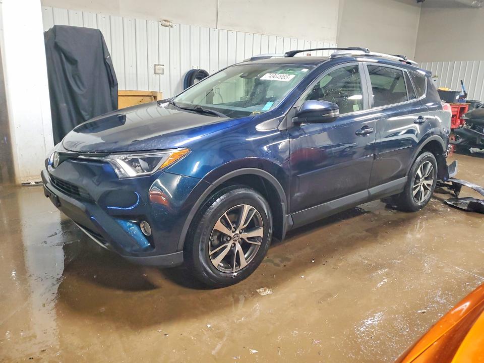 TOYOTA RAV4 2017 with VIN JTMRFREVXHJ712679 - Photo from auction
