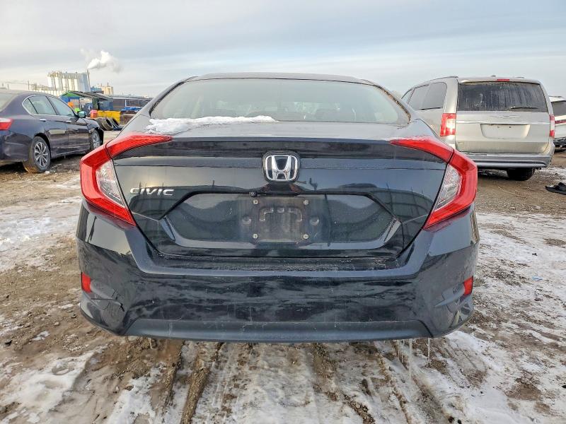 Photo 6 from auction – 2016 HONDA CIVIC LX with VIN 19XFC2F55GE018673
