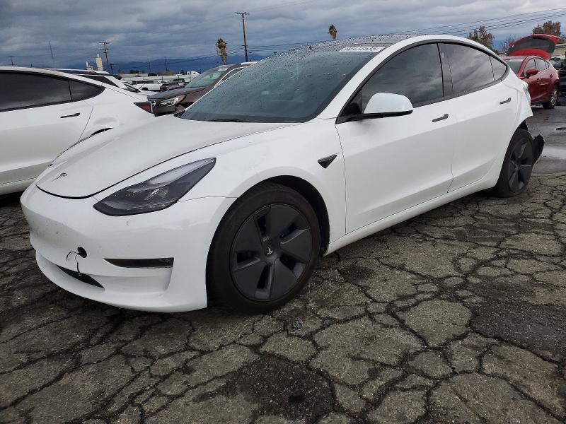 TESLA MODEL 3 2022 with VIN 5YJ3E1EB1NF334397 - Photo from auction