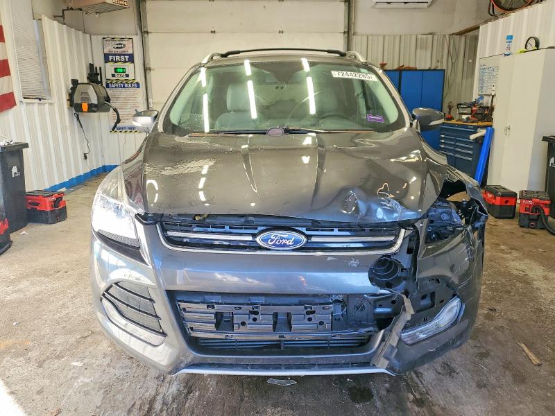 Photo 5 from auction – 2015 FORD ESCAPE with VIN 1FMCU9J9XFUC82387