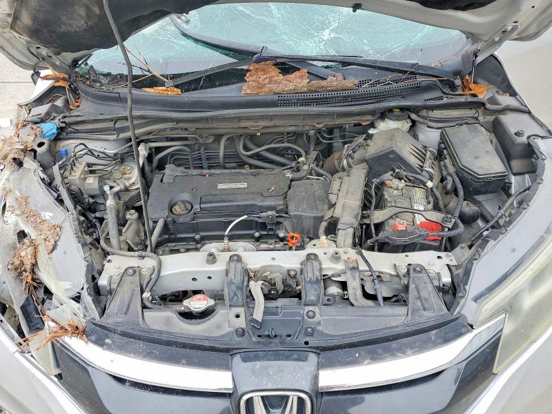 Photo 11 from auction – 2016 HONDA CR-V with VIN 2HKRM3H76GH535507